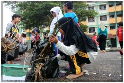 40 Anak Usia Dini Bersihkan Pelabuhan Mattoanging