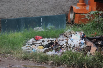 Minimnya Kesadaran Buang Sampah Anak Kota