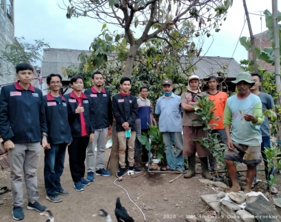 Mahasiswa PMM 98 Implementasikan Alat Penyiraman Otomatis pada Kebun Jeruk di Dusun Krajan