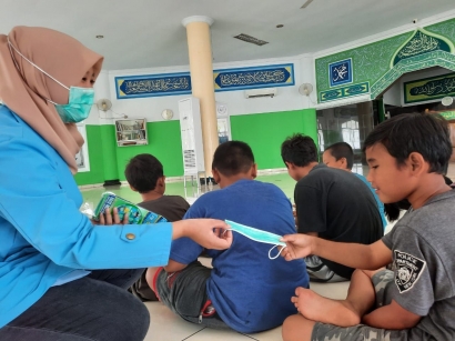 KKN STMIK Nusa Mandiri: Penerapan Protokol Kesehatan di Lingkungan Masjid At-Tauhid