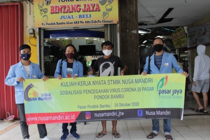 Sosialisasi Masyarakat terhadap Dampak Covid-19 di Pasar Jaya Pondok Bambu