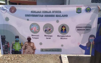 Cegah Penyebaran Covid-19, Mahasiswa KKN UM 2021 Melakukan Pembuatan Banner "Kesehatan" untuk Desa Bocek