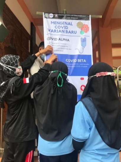 Pengenalan dan Upaya Pencegahan Covid Varian Baru Melalui Media Cetak di Desa Ardimulyo oleh Mahasiswa KKN UM