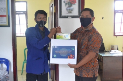 KKN UM Memberikan 1000 Masker kepada Desa Buntut Wetan sebagai Upaya Preventif  Penyebaran Covid-19