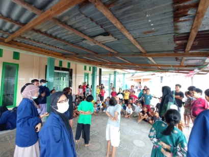 Peringatan HUT ke 76 RI Wilayah Tambelan Sampit dengan Lomba Makan Kerupuk