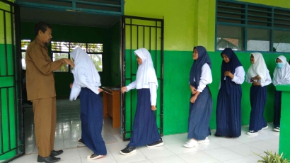 Koneksi Antarmateri Modul 1.4 Penerapan Budaya Positif pada SMPN 2 Bajeng Barat Kabupaten Gowa