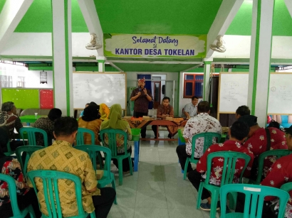 Kadis DPMD Situbondo Hadir dalam Rapat Konsolidasi Perangkat Desa di Kantor Desa Tokelan