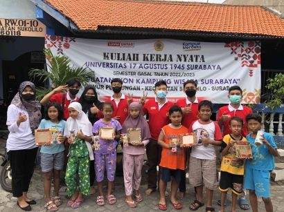 Mahasisawa KKN UNTAG Surabaya Memanfaatkan Kardus Bekas Menjadi Pigora Untuk Meningkatkan Kreativitas  Anak