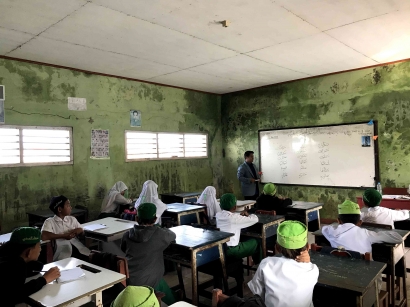 "Pelatihan Tilawati dalam Mengembangkan Bacaan Al-Qur'an Bagi Peserta Didik Madrasah Ibtidaiyah"