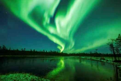 Auroras: Natural Light Display Shimmers in the Sky
